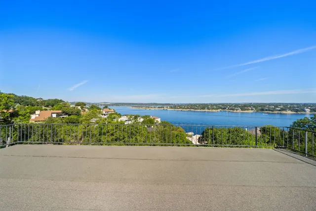 a view of a lake with a city view