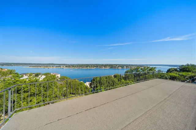 a view of a street with an ocean view