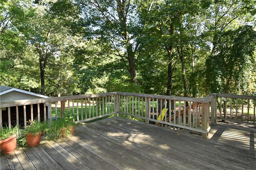 6280 Styers Ferry Road Clemmons, NC 27012 - Photo 13 of 19 Deck overlooks playset and 1 acre yard.