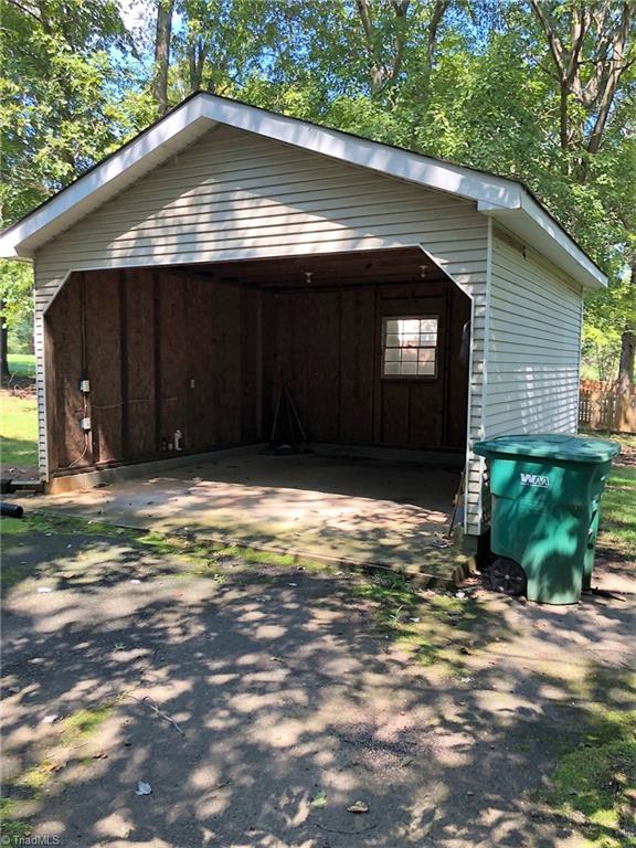 6280 Styers Ferry Road Clemmons, NC 27012 - Photo 19 of 19 Detached open garage has electricity and is great for parking or workshop.