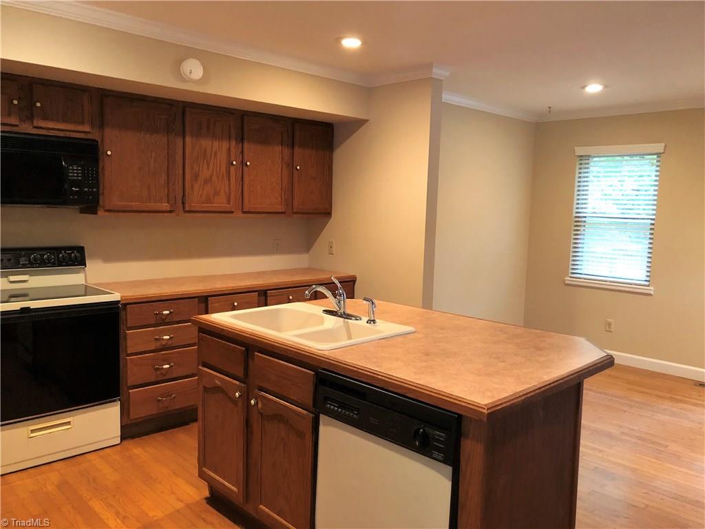 6280 Styers Ferry Road Clemmons, NC 27012 - Photo 6 of 19 Kitchen island with bar.