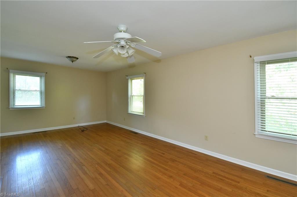 6280 Styers Ferry Road Clemmons, NC 27012 - Photo 8 of 19 Large master bedroom with hardwood floors and lots of closet space.