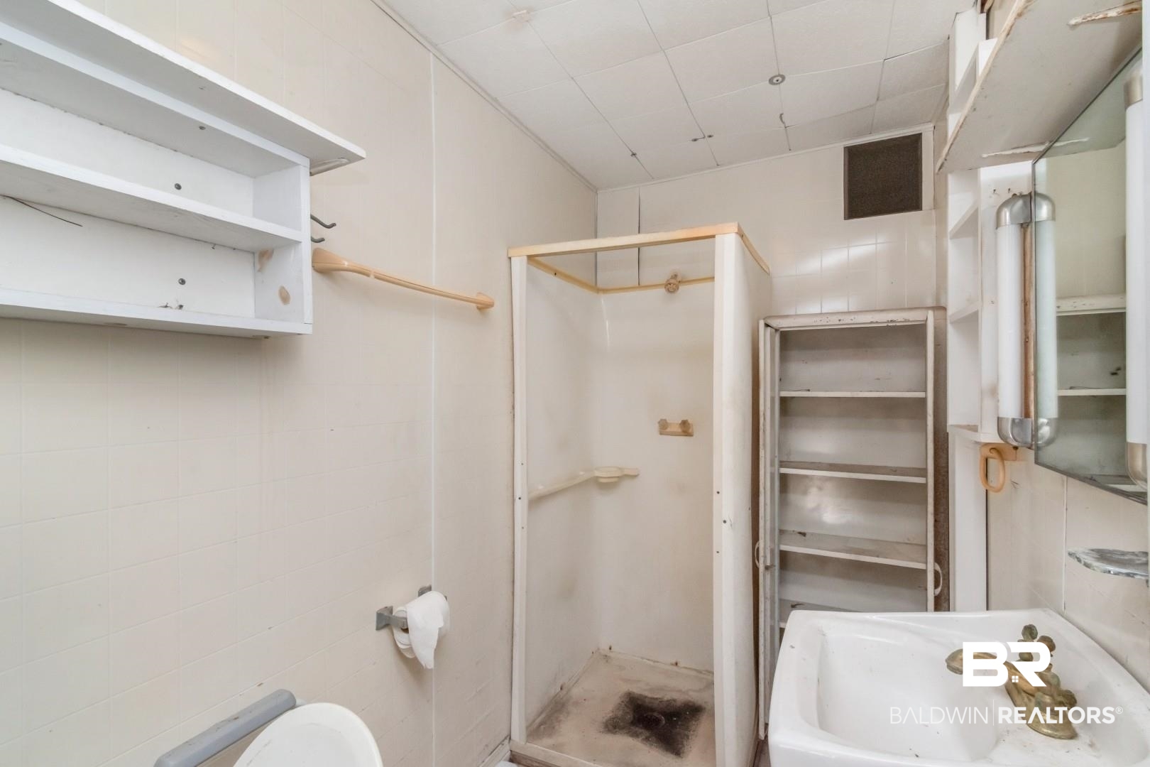 6300 Woodcrest Drive Mobile, AL 36608 - Photo 18 of 35 Full bath featuring a sink, visible vents, and a shower stall