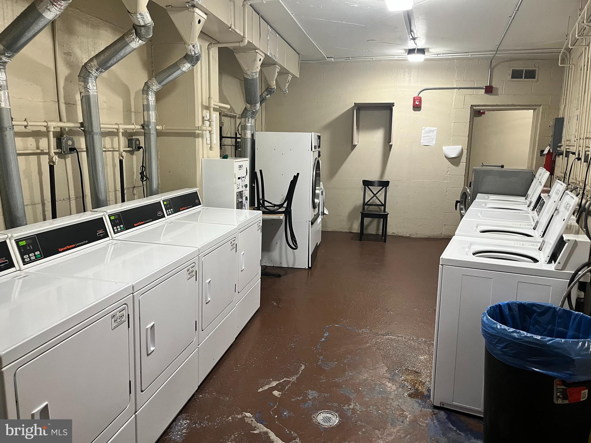 1239 Vermont Avenue Northwest, Unit 104 Washington, DC 20005 - Photo 22 of 30 a utility room with dryer and washer