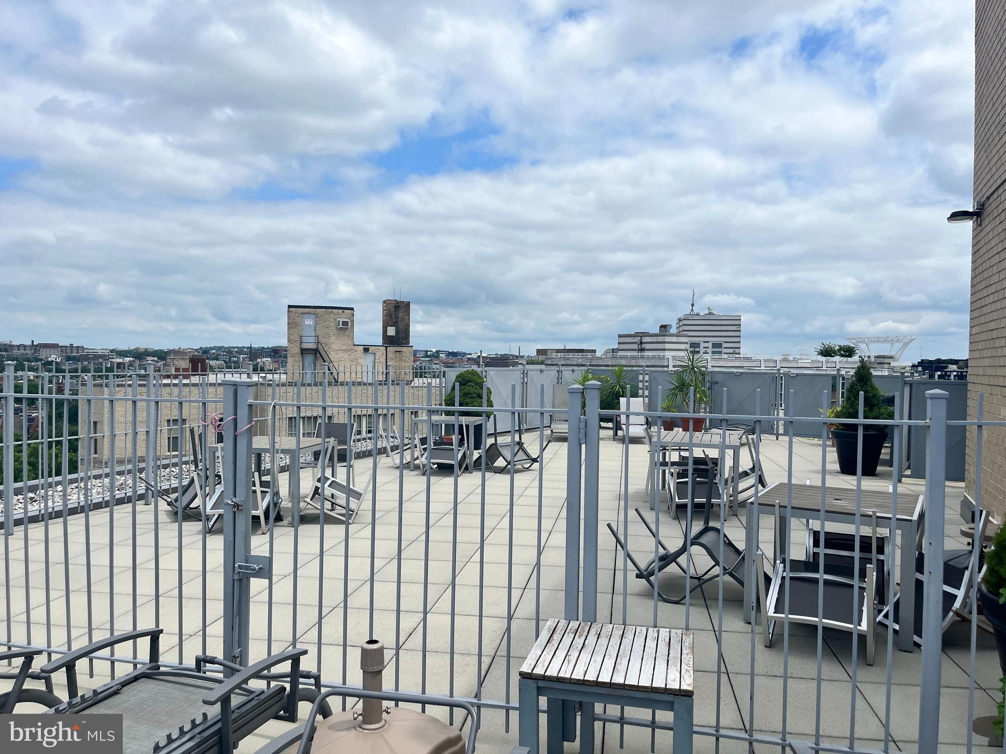 1239 Vermont Avenue Northwest, Unit 104 Washington, DC 20005 - Photo 24 of 30 a view of a balcony with chairs