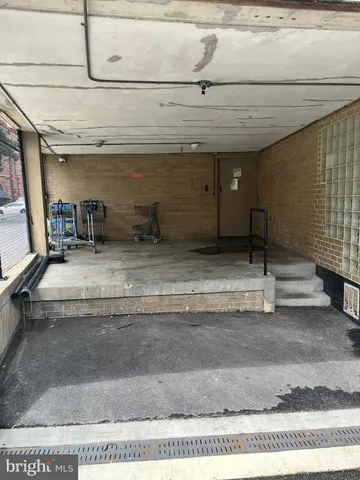 a view of a room with wooden walls