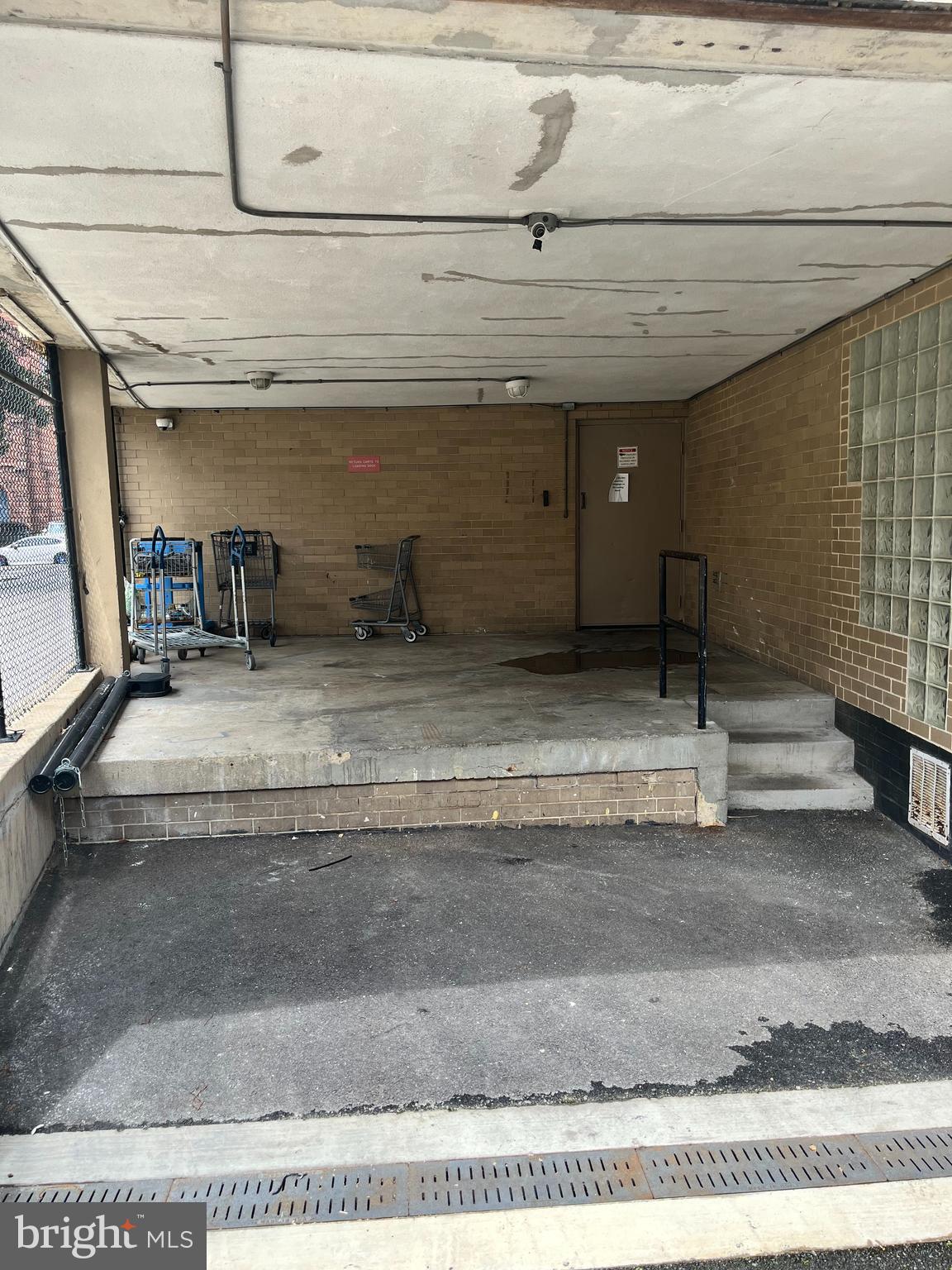 1239 Vermont Avenue Northwest, Unit 104 Washington, DC 20005 - Photo 28 of 30 a view of a room with wooden walls