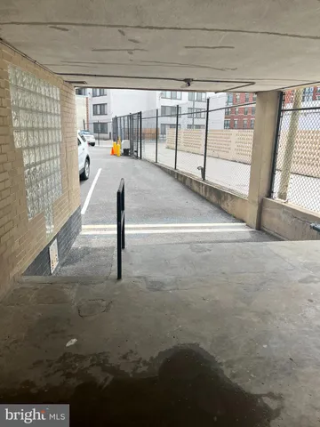 a view of an empty room with windows