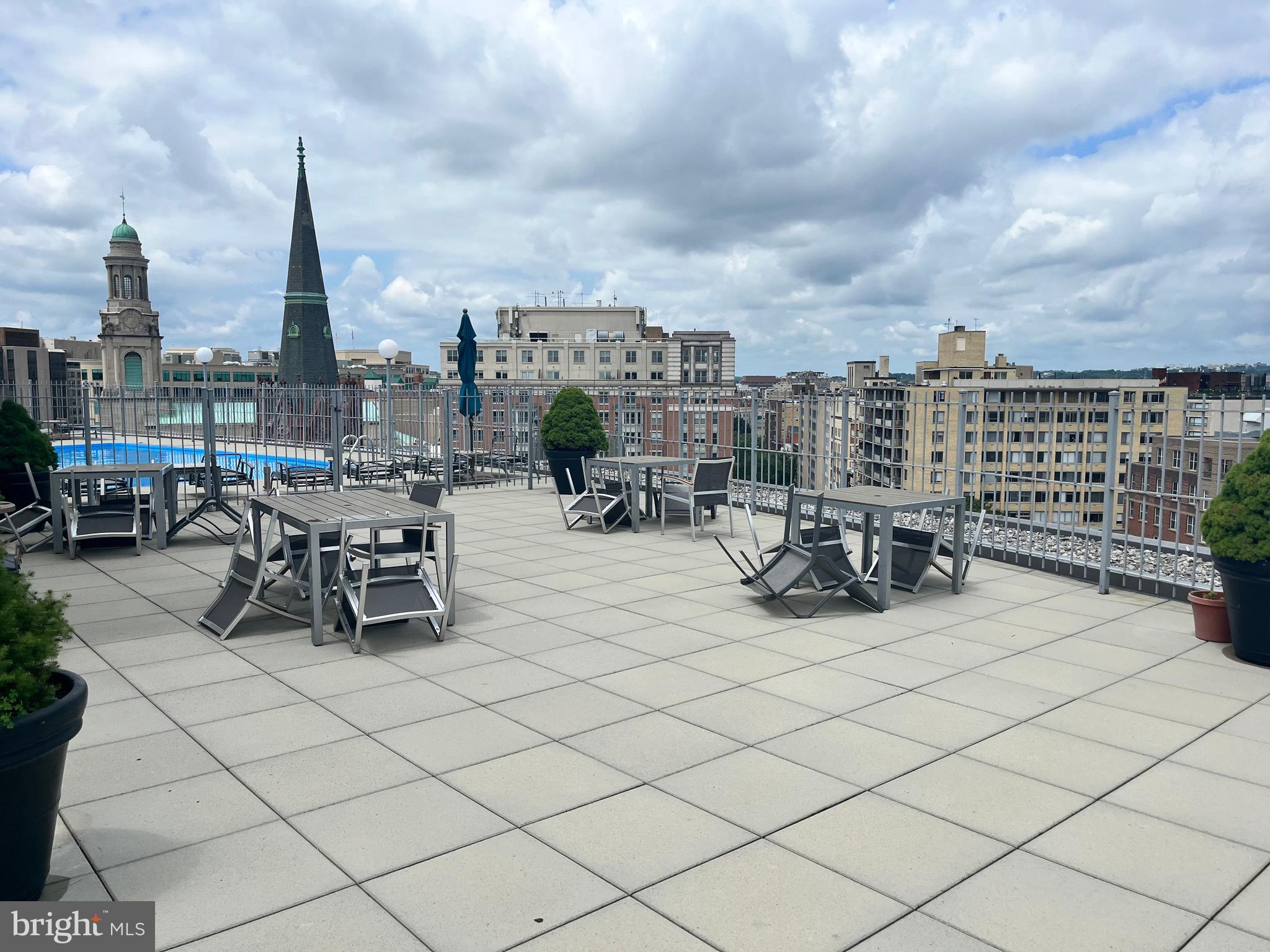1239 Vermont Avenue Northwest, Unit 104 Washington, DC 20005 - Photo 4 of 30 a view of a terrace with chairs