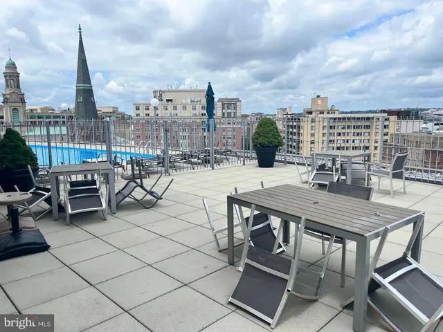 a view of a terrace with furniture