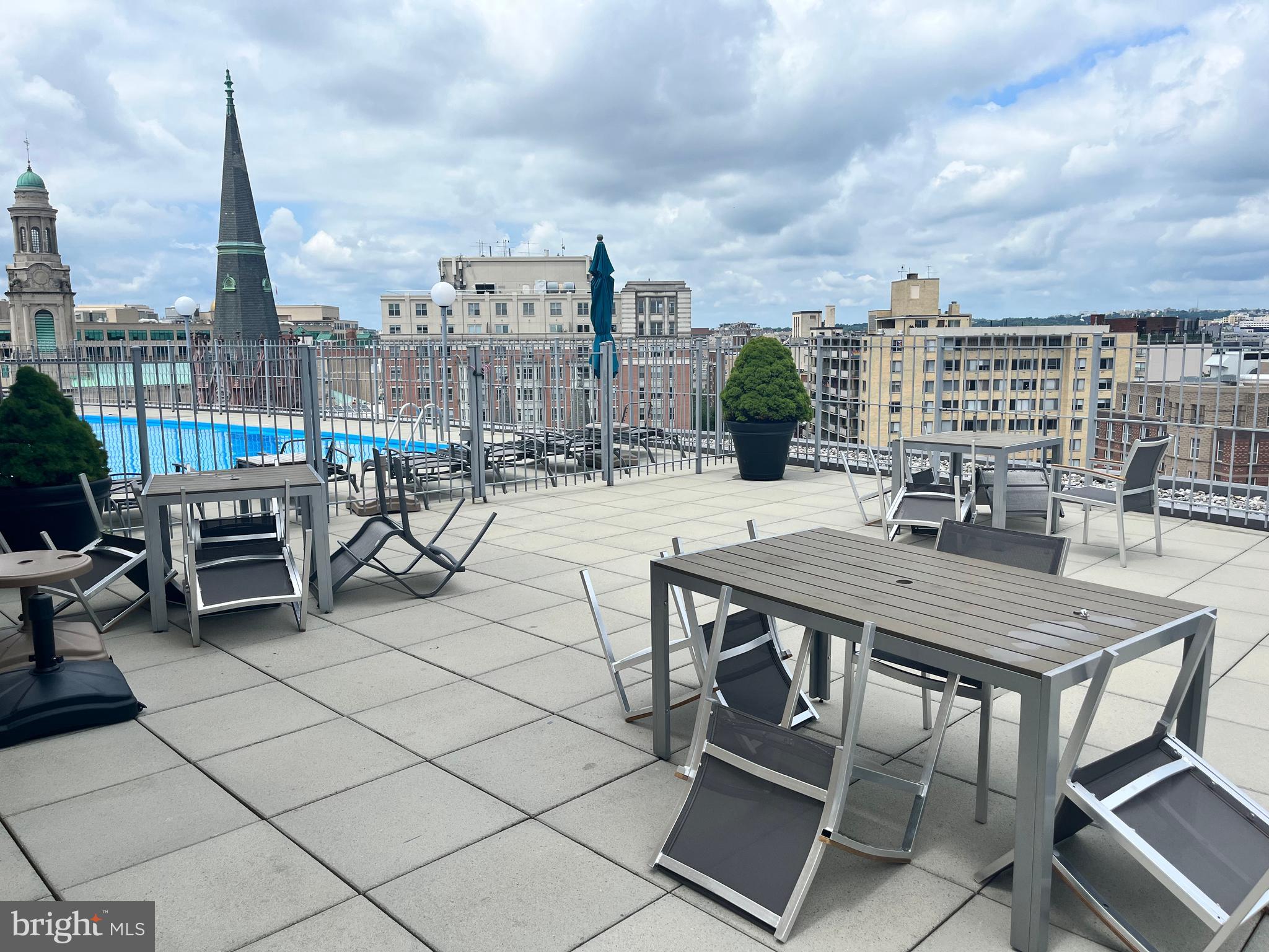 1239 Vermont Avenue Northwest, Unit 104 Washington, DC 20005 - Photo 5 of 30 a view of a terrace with furniture