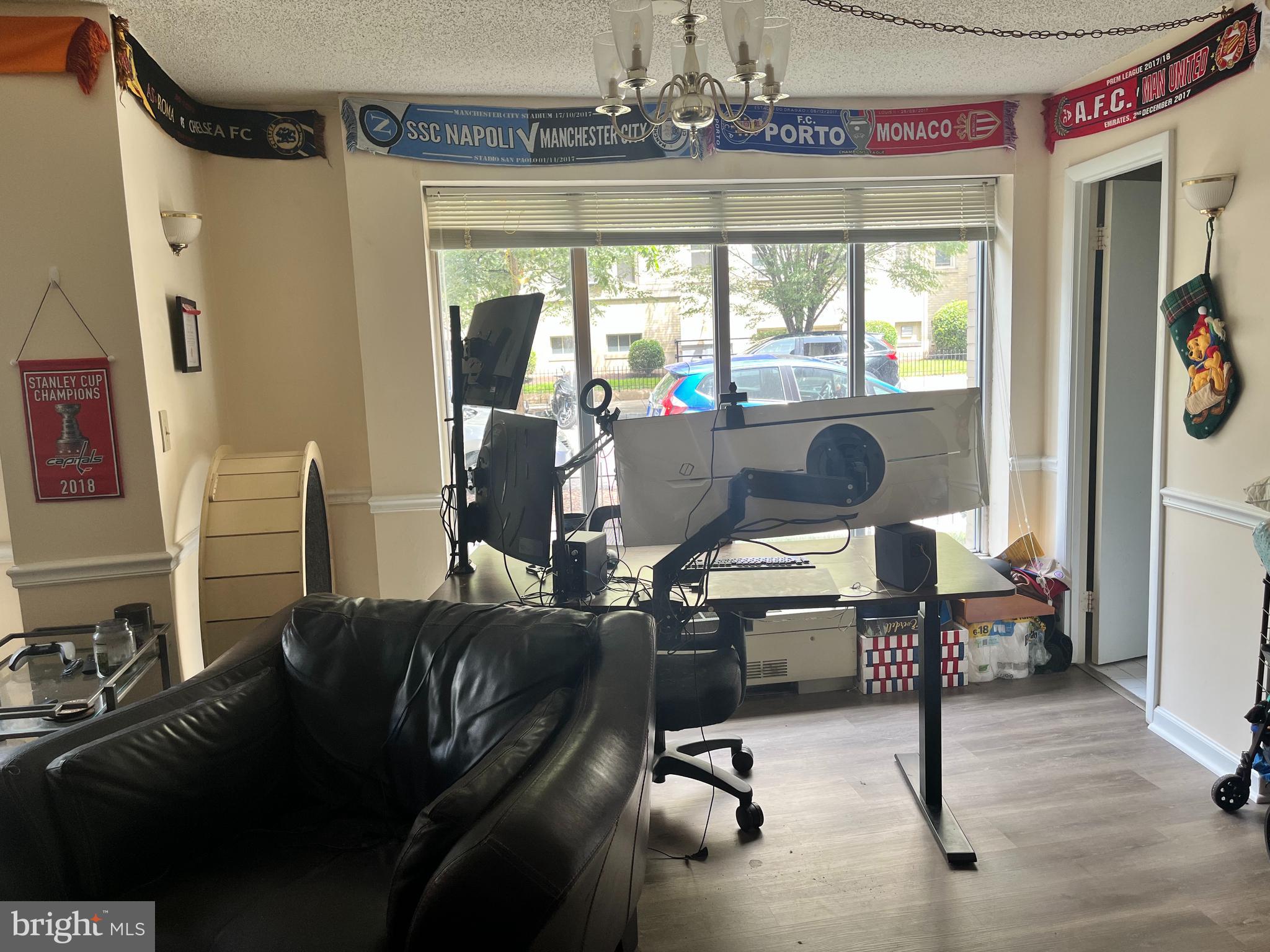 1239 Vermont Avenue Northwest, Unit 104 Washington, DC 20005 - Photo 10 of 30 a living room with furniture