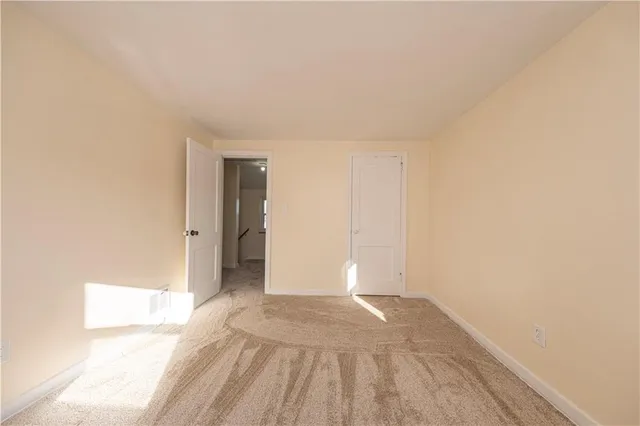 a view of an empty room and window