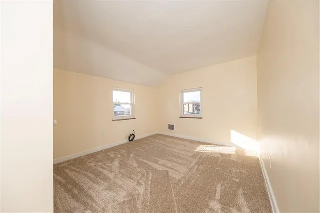 a view of a bedroom with a window