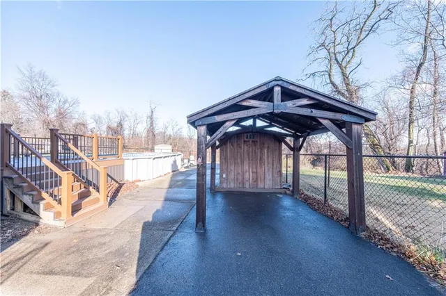 a view of balcony with deck and wooden floor