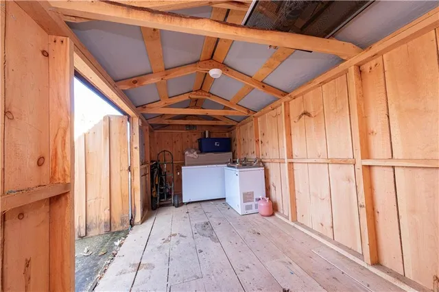 a view of a porch with wooden floor