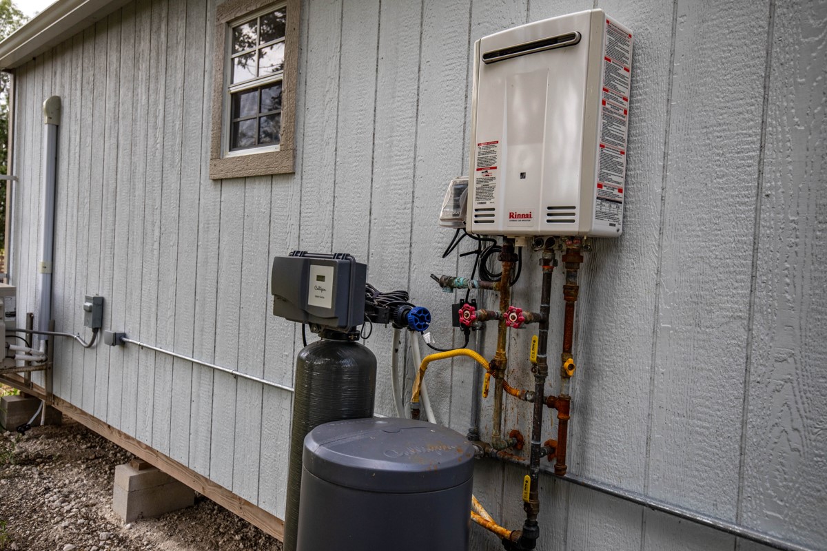 143 Harrison Road Beeville, TX 78102 - Photo 14 of 39 Utilities with tankless water heater
