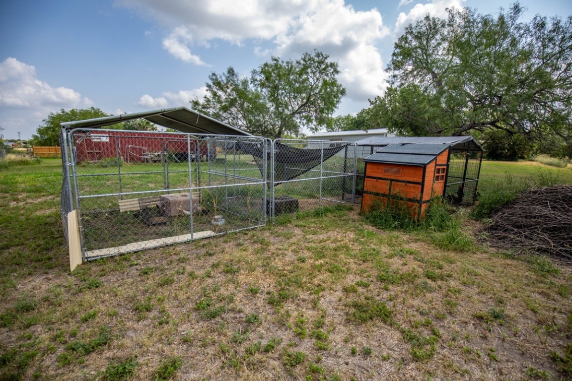 143 Harrison Road Beeville, TX 78102 - Photo 26 of 39 View of yard with exterior structure and an outbuilding