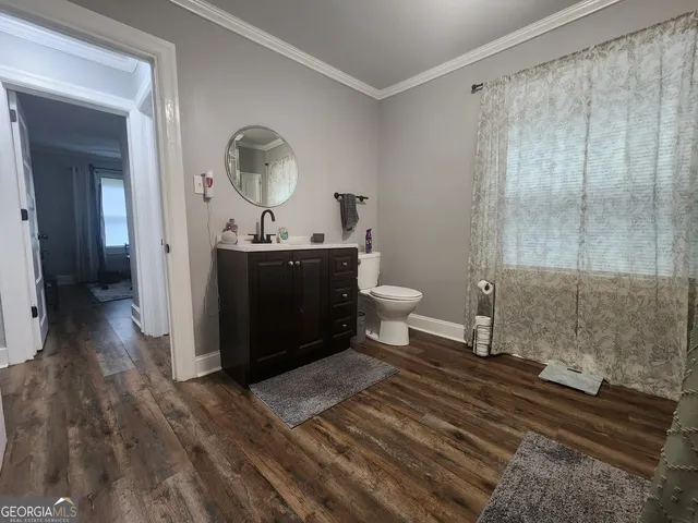 a view of a living room and dining room