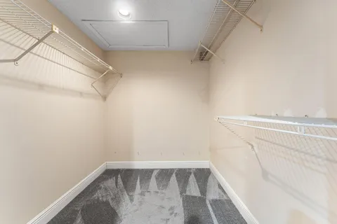 a bathroom with a toilet and shower