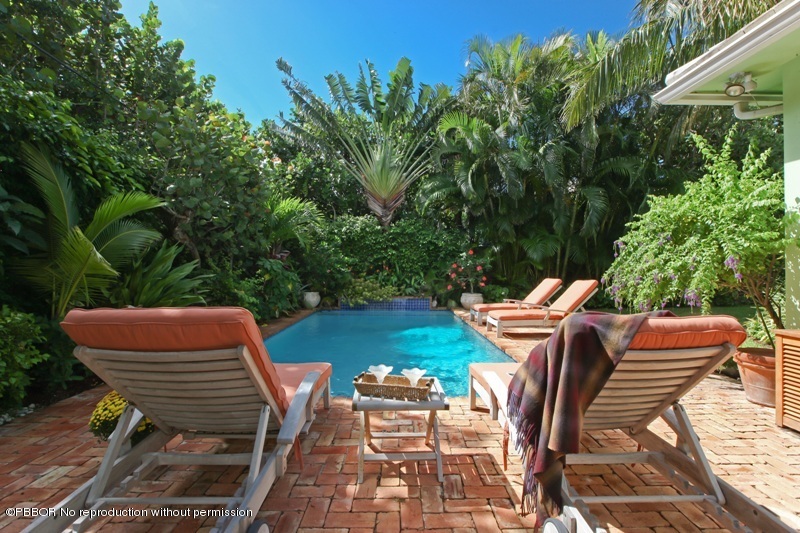105 Dolphin Road Ocean Ridge, FL 33435 - Photo 13 of 13 a view of a chairs and table in patio