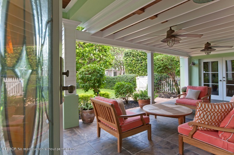 105 Dolphin Road Ocean Ridge, FL 33435 - Photo 3 of 13 a outdoor living space with furniture and garden view
