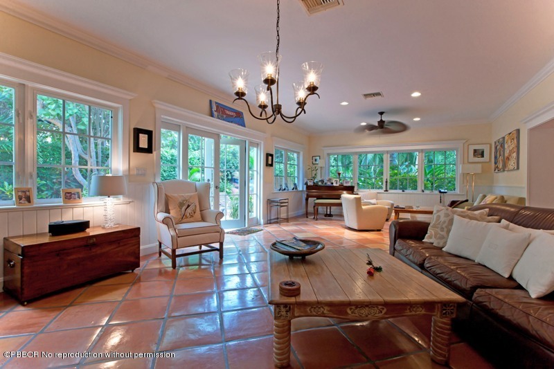 105 Dolphin Road Ocean Ridge, FL 33435 - Photo 5 of 13 a living room with fireplace furniture and a large window