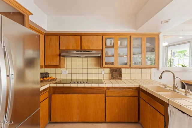 a kitchen with a sink and a window