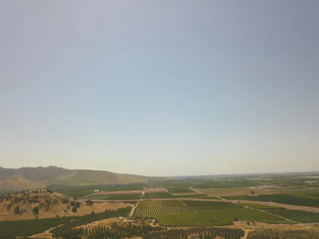 a view of an ocean with beach