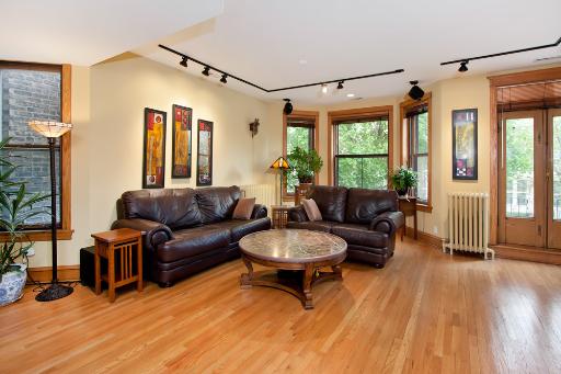 3638 North Fremont Street Chicago, IL 60613 - Photo 2 of 10 a living room with furniture and a large window
