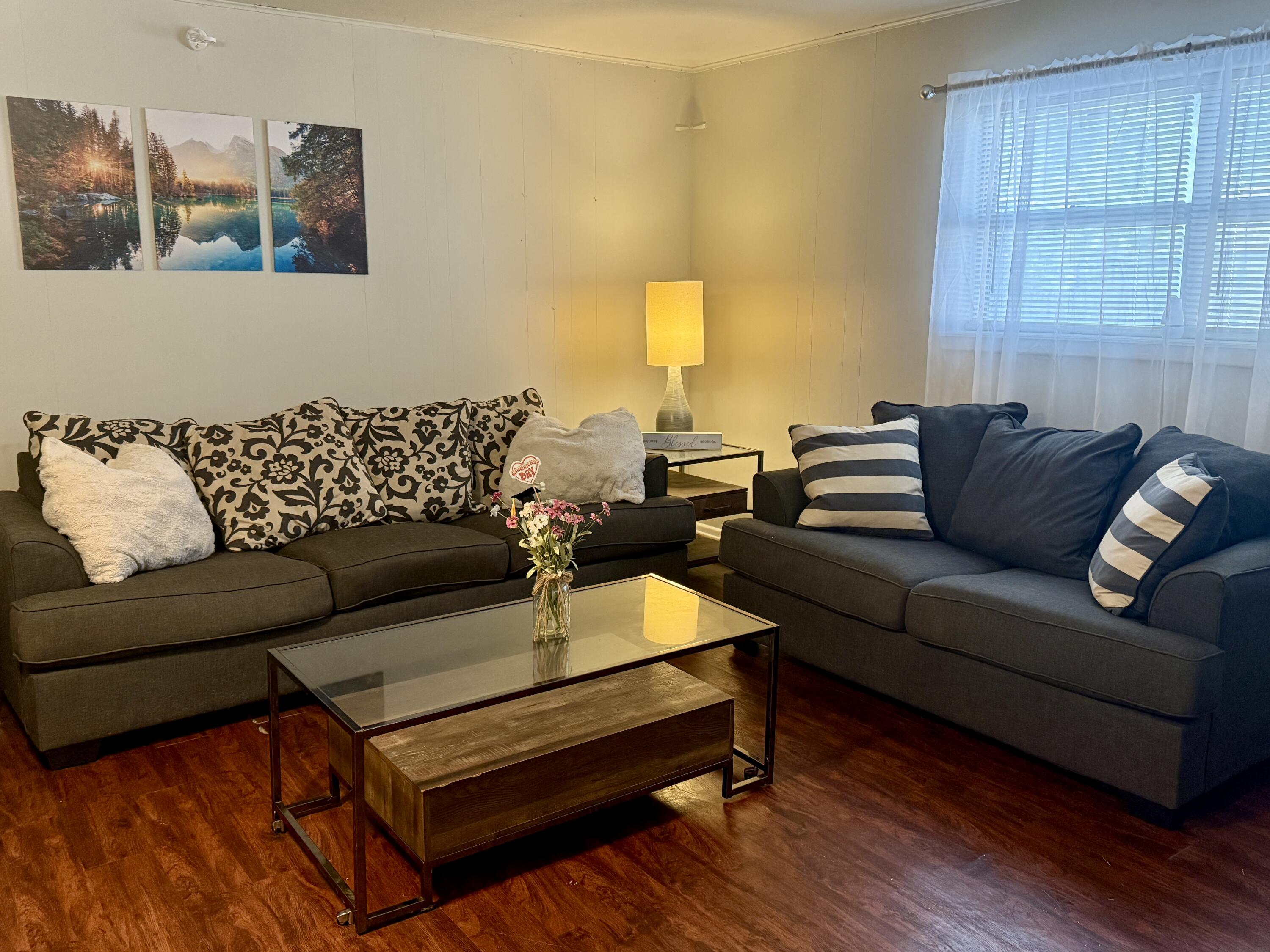 2214 40th Street Lubbock, TX 79412 - Photo 11 of 58 a living room with furniture and a couch