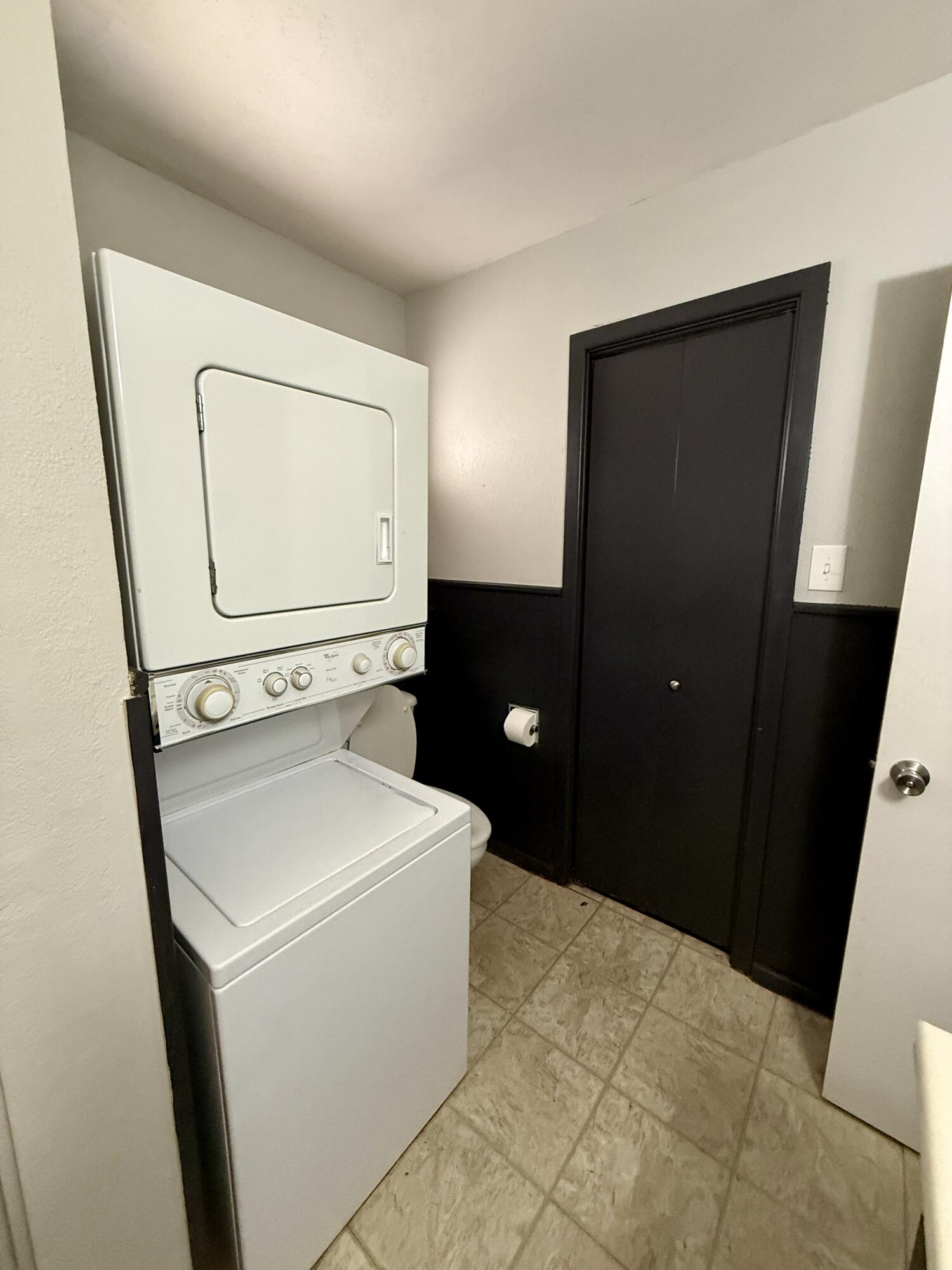 2214 40th Street Lubbock, TX 79412 - Photo 35 of 58 a utility room with dryer and washer