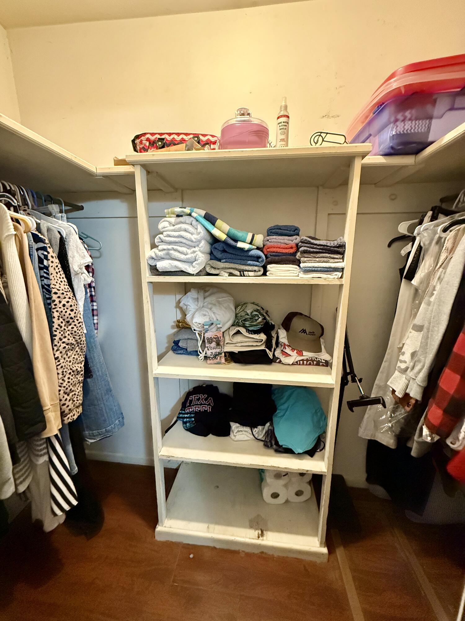 2214 40th Street Lubbock, TX 79412 - Photo 37 of 58 a view of walk in closet with clothes and shoes
