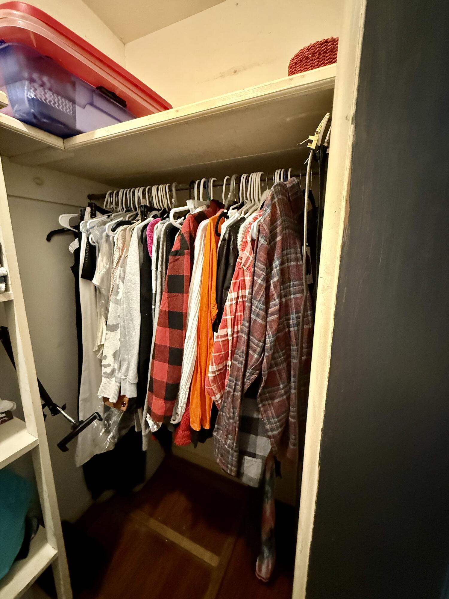2214 40th Street Lubbock, TX 79412 - Photo 39 of 58 a view of walk in closet with clothes and shoes