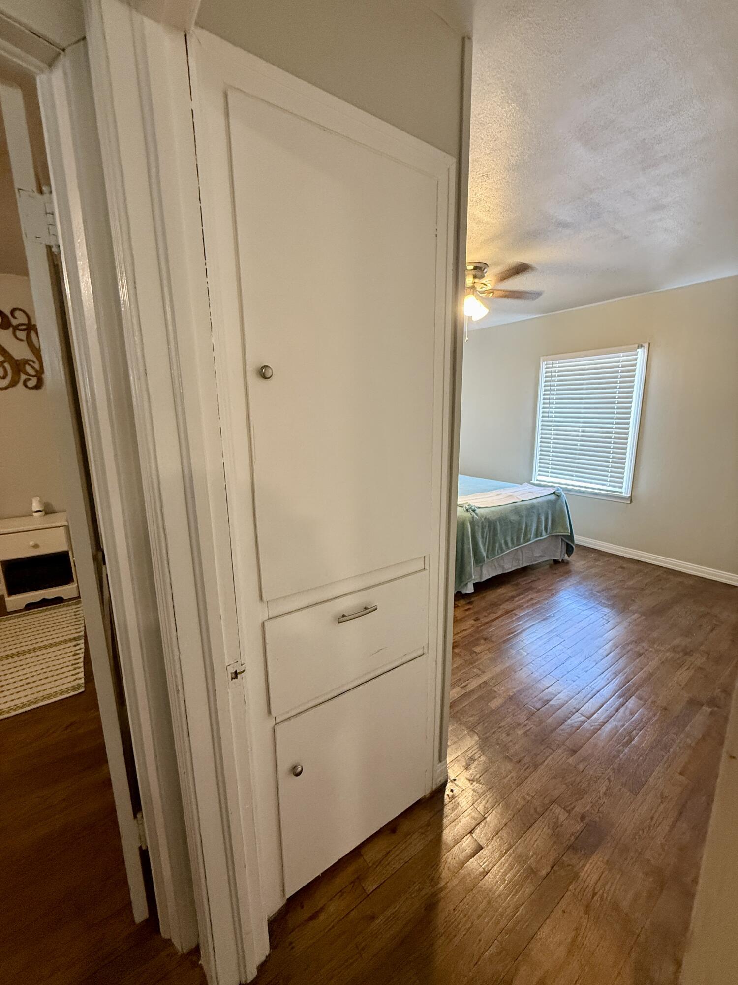 2214 40th Street Lubbock, TX 79412 - Photo 42 of 58 a view of a room with wooden floor