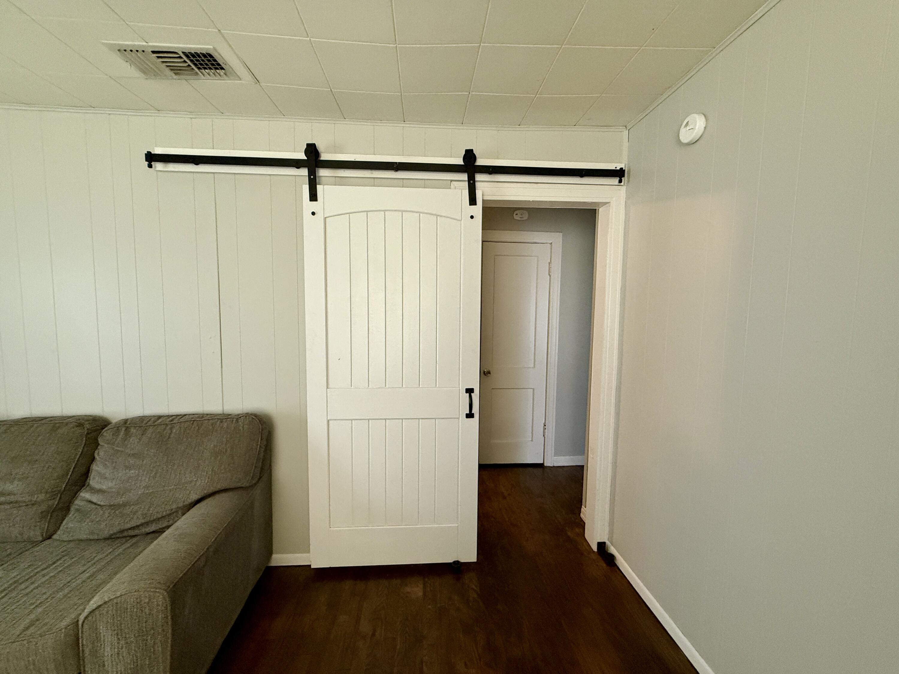 2214 40th Street Lubbock, TX 79412 - Photo 46 of 58 a living room with furniture and a ceiling fan
