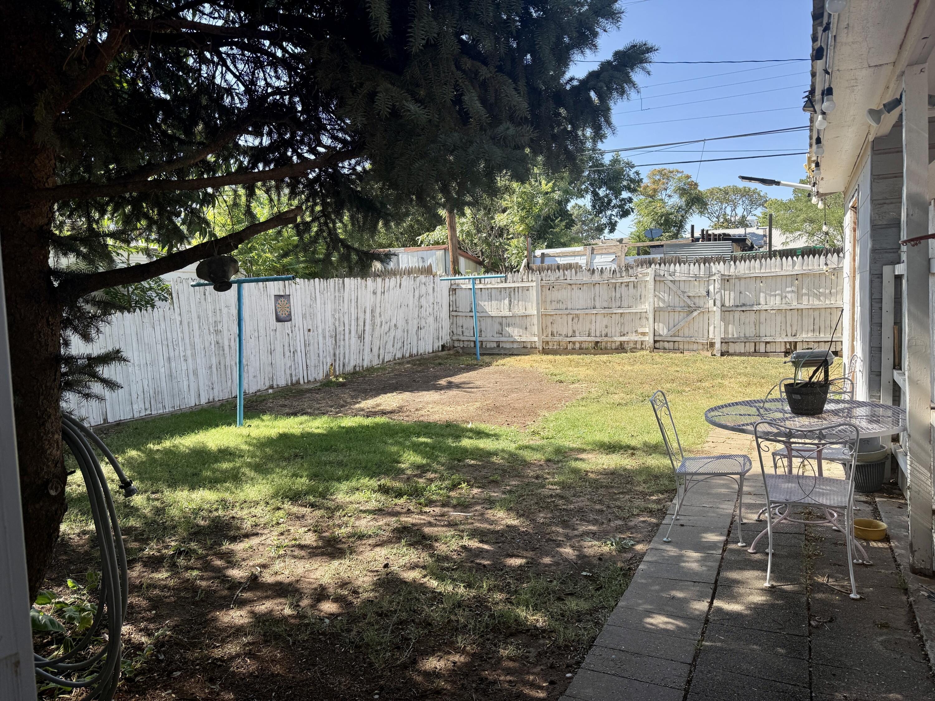 2214 40th Street Lubbock, TX 79412 - Photo 47 of 58 a view of a backyard with a patio