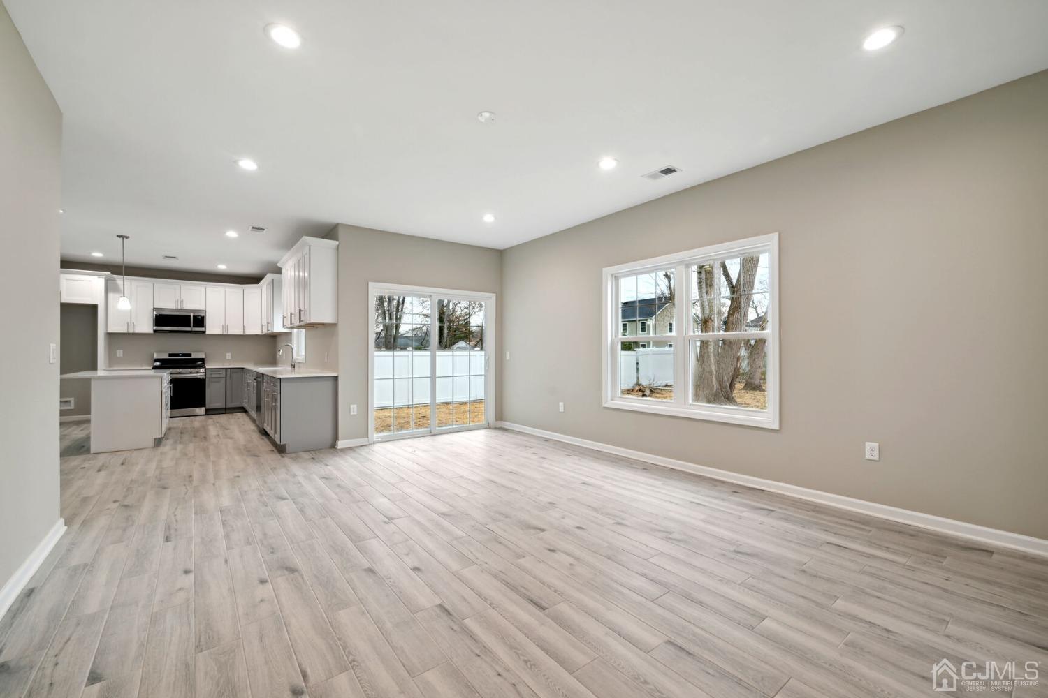66 Runyon Avenue Edison, NJ 08817 - Photo 11 of 34 a view of kitchen with stainless steel appliances refrigerator oven and stove