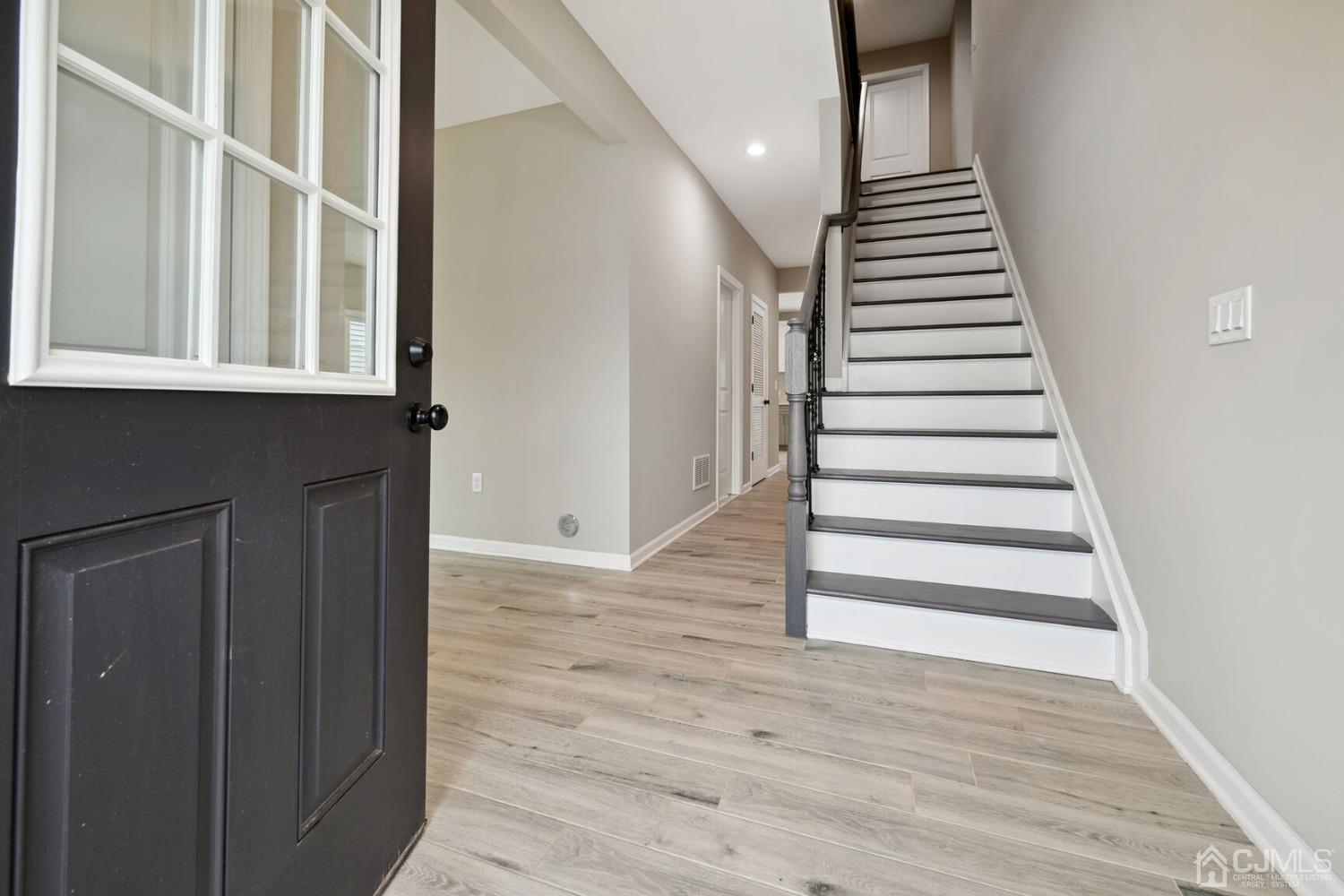 66 Runyon Avenue Edison, NJ 08817 - Photo 19 of 34 a view of an entryway with wooden floor