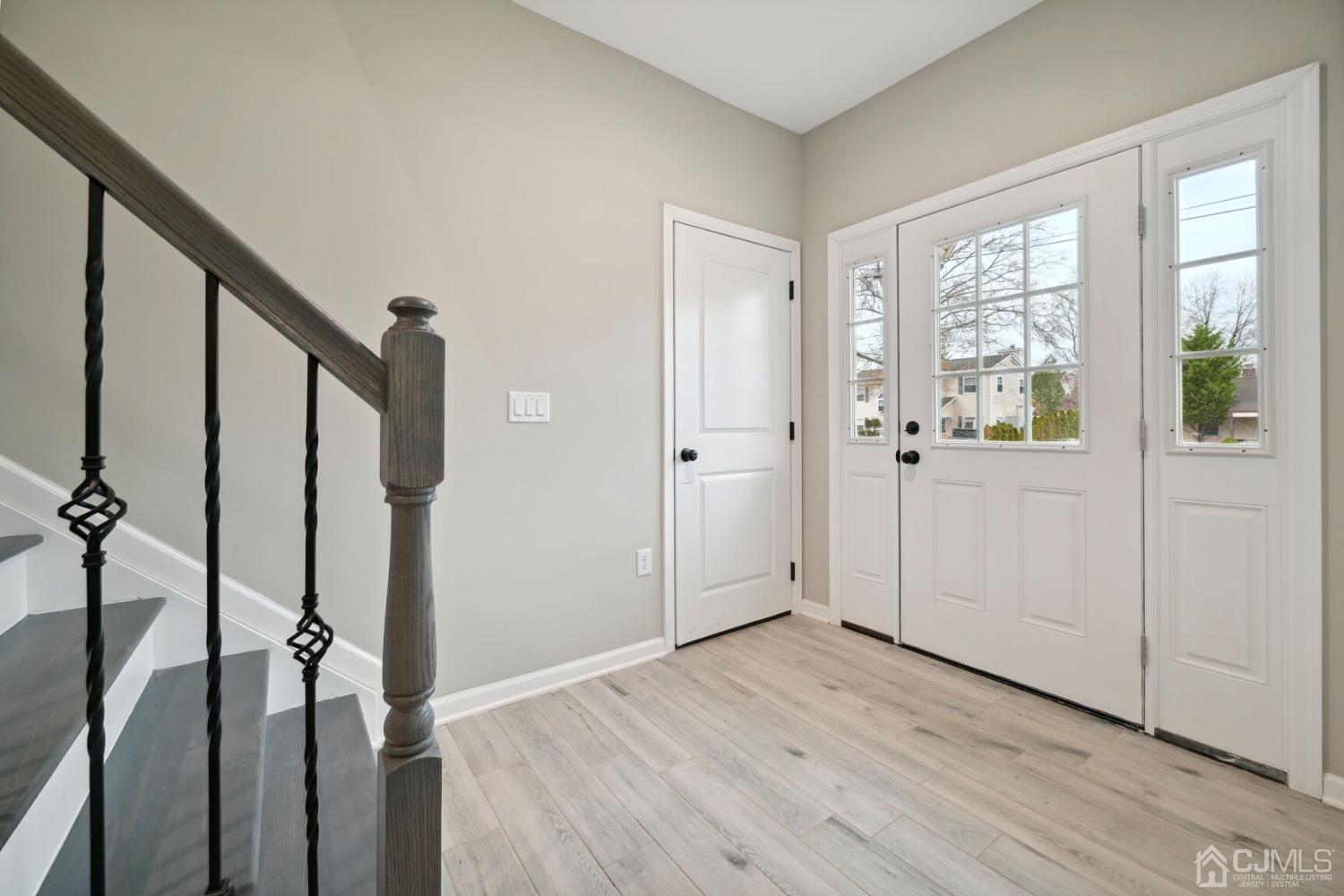 66 Runyon Avenue Edison, NJ 08817 - Photo 20 of 34 a view of empty room with wooden floor and fan