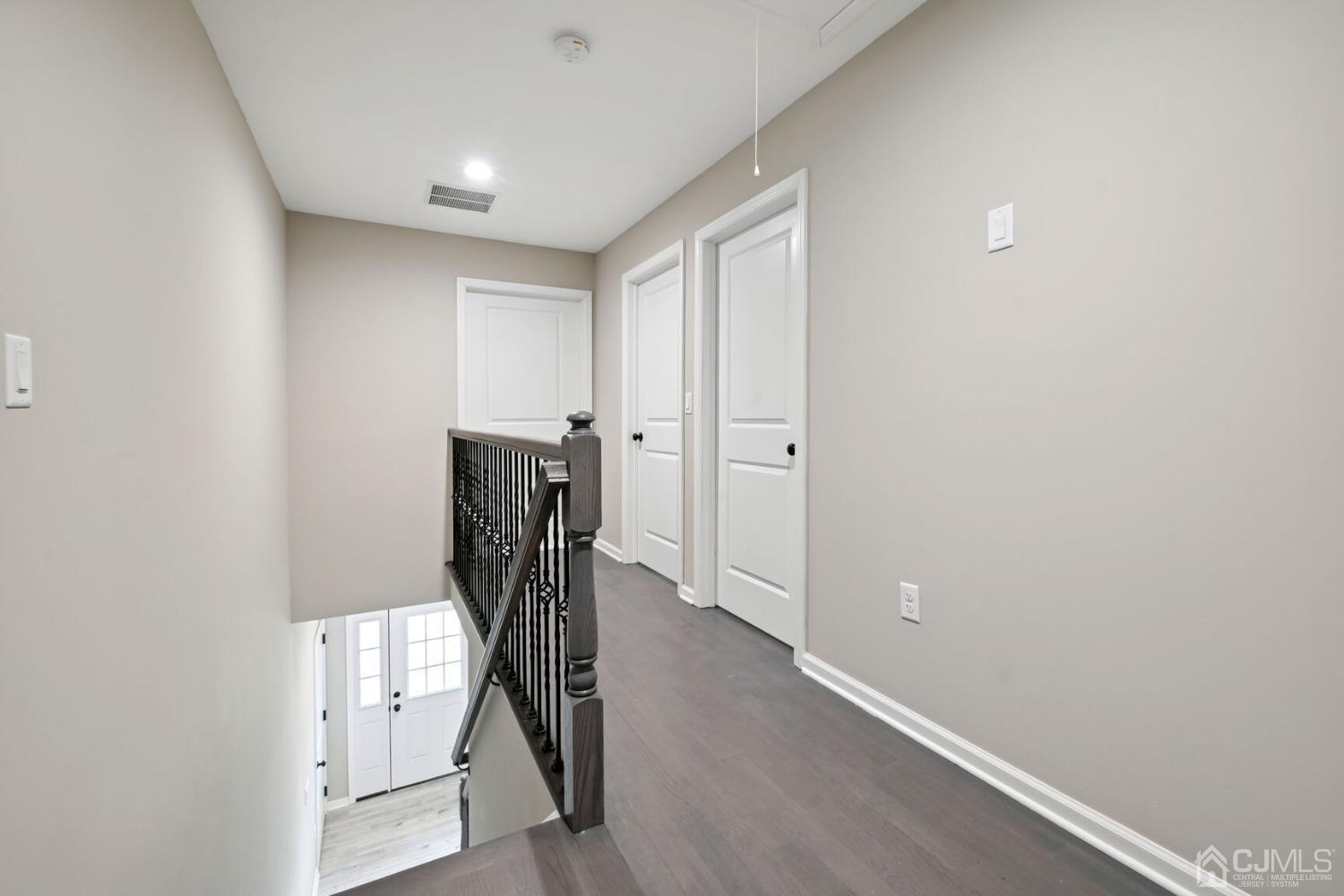 66 Runyon Avenue Edison, NJ 08817 - Photo 21 of 34 a view of a hallway with stairs