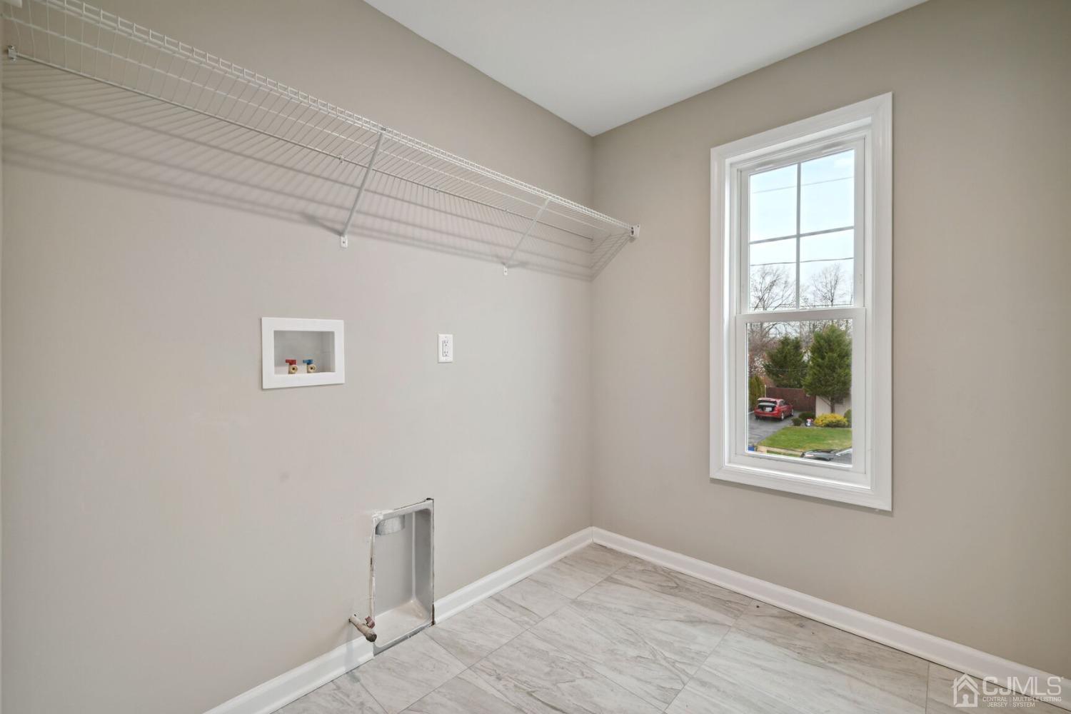 66 Runyon Avenue Edison, NJ 08817 - Photo 22 of 34 an empty room with windows