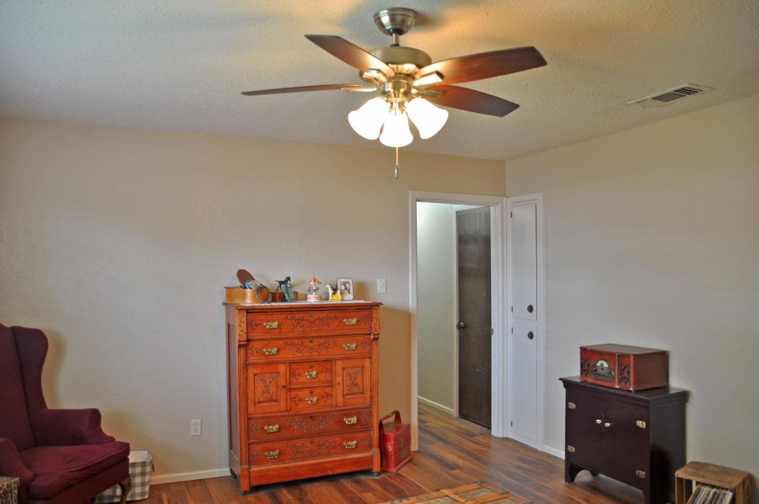 1511 Ave J Abernathy, TX 79311 - Photo 13 of 24 a view of a workspace with furniture and a window