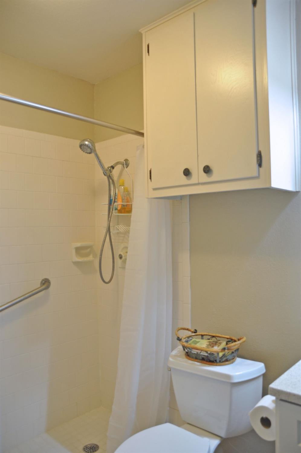 1511 Ave J Abernathy, TX 79311 - Photo 19 of 24 a bathroom with a granite countertop sink toilet and a mirror