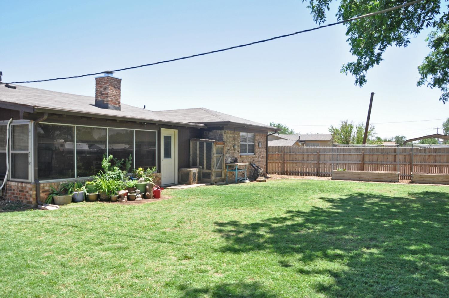 1511 Ave J Abernathy, TX 79311 - Photo 24 of 24 a view of a house with a yard and plants