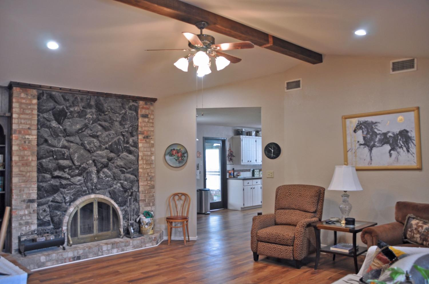 1511 Ave J Abernathy, TX 79311 - Photo 5 of 24 a living room with furniture and wooden floor