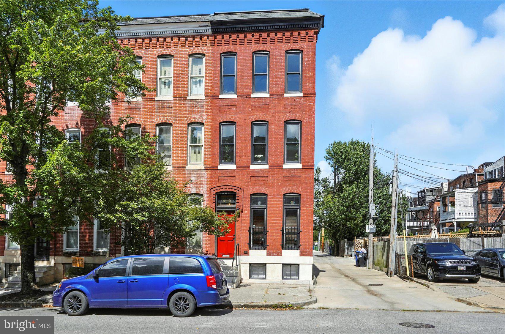 416 Mosher Street Baltimore, MD 21217 - Photo 2 of 38 a car parked in front of a building