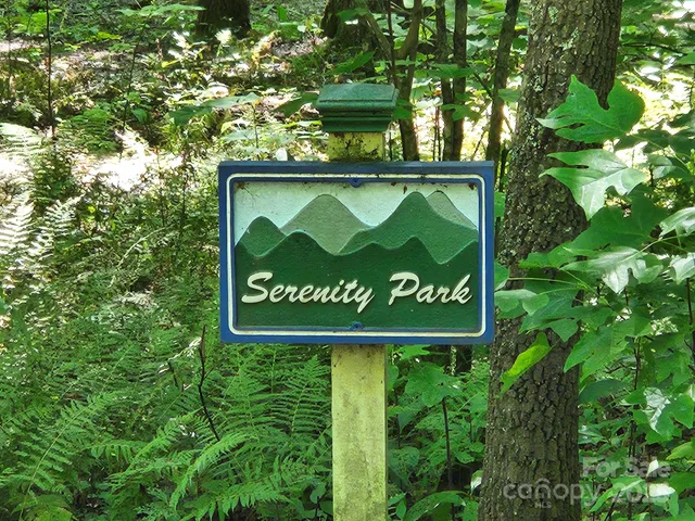 a sign broad on the tree