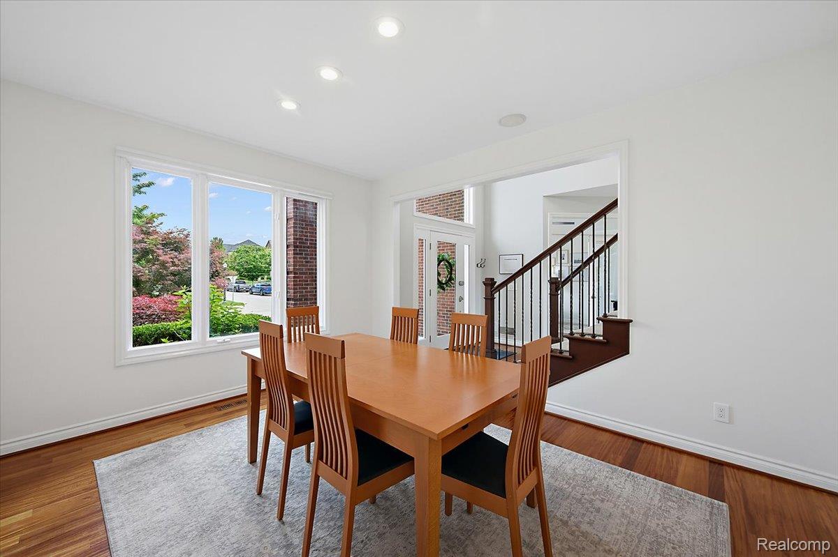 1422 Galena Rochester, MI 48306 - Photo 10 of 73 Dining area featuring hardwood flooring, recessed lighting, and a large window providing abundant natural light