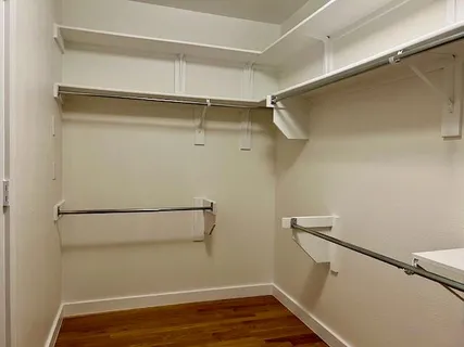 a view of a room with racks on the wall